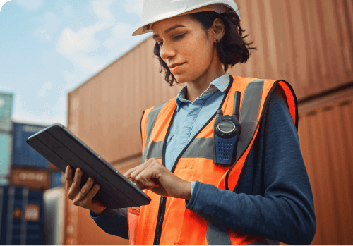 worker reviewing business electricity suppliers.