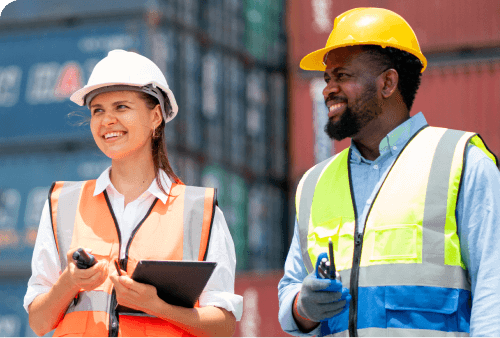 employees reviewing electricity for a warehouse.